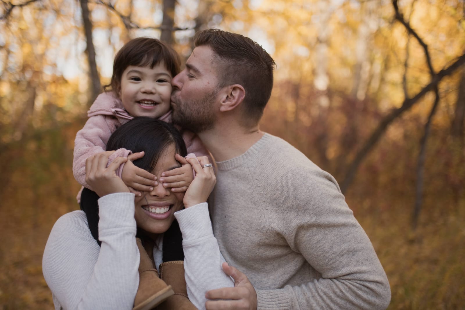 Family photography Edmonton — family laughing together