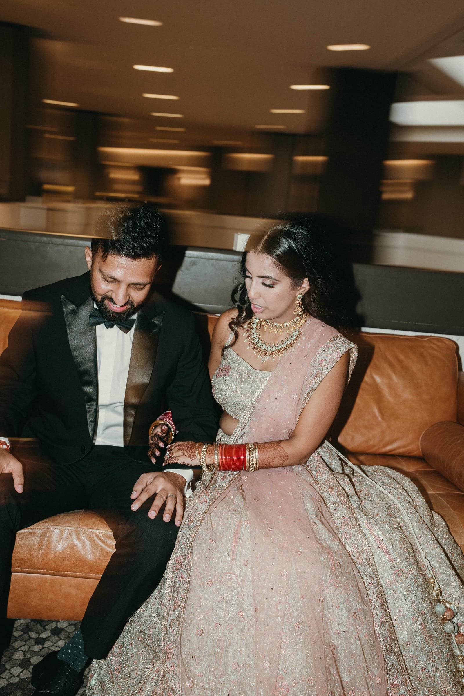 Indian wedding photography Edmonton — dupatta draping moment