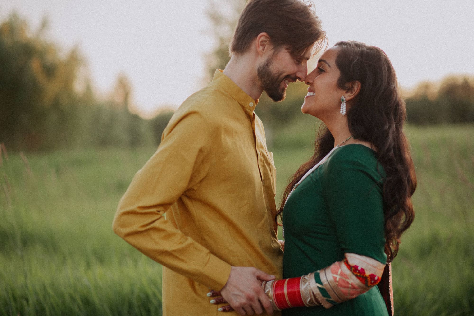 Indian wedding photography Edmonton — dupatta draping moment