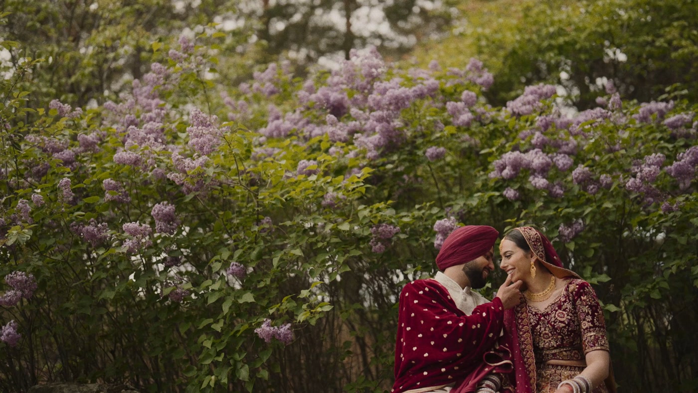Indian wedding photographer Edmonton — Sikh couple with lilac flowers captured by MH Photography